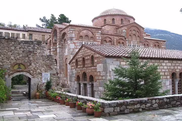 Hosios Loukas Monastery courtyard near Delphi, Byzantine architecture stop on a Delphi full day tour in Greece