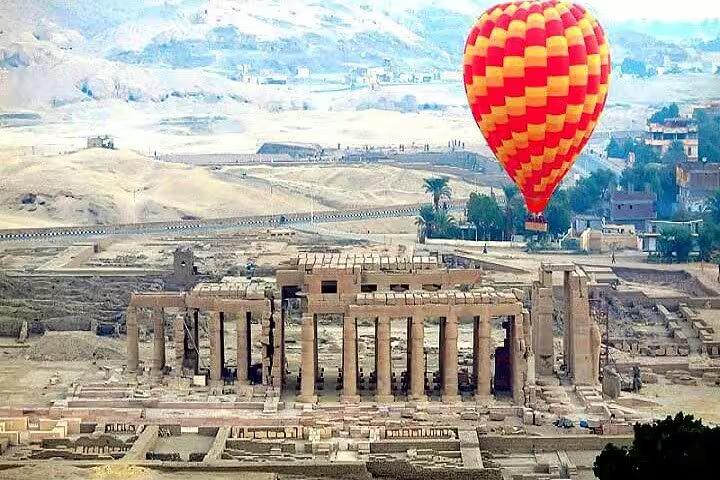 Hot air balloon above Luxor temple ruins, iconic Egypt highlight on private day tour from Sharm El Sheikh