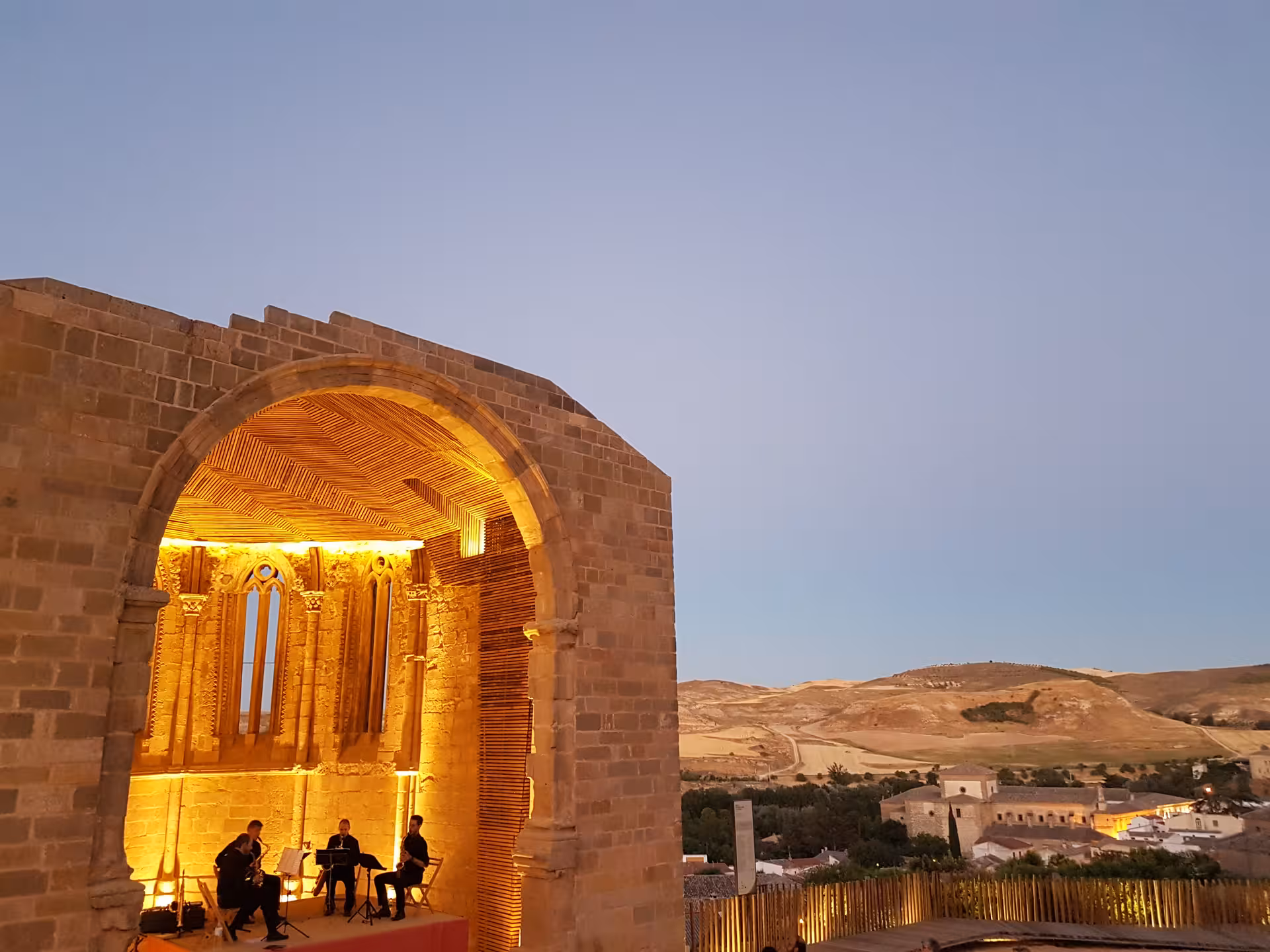 Illuminated Gothic arch viewpoint at sunset in Huete, Cuenca, seen on the Guided tour of Huete Monumental