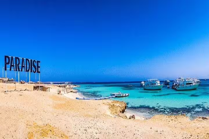Hula Hula Island beach near Hurghada with VIP boats on turquoise Red Sea, ideal snorkeling day trip