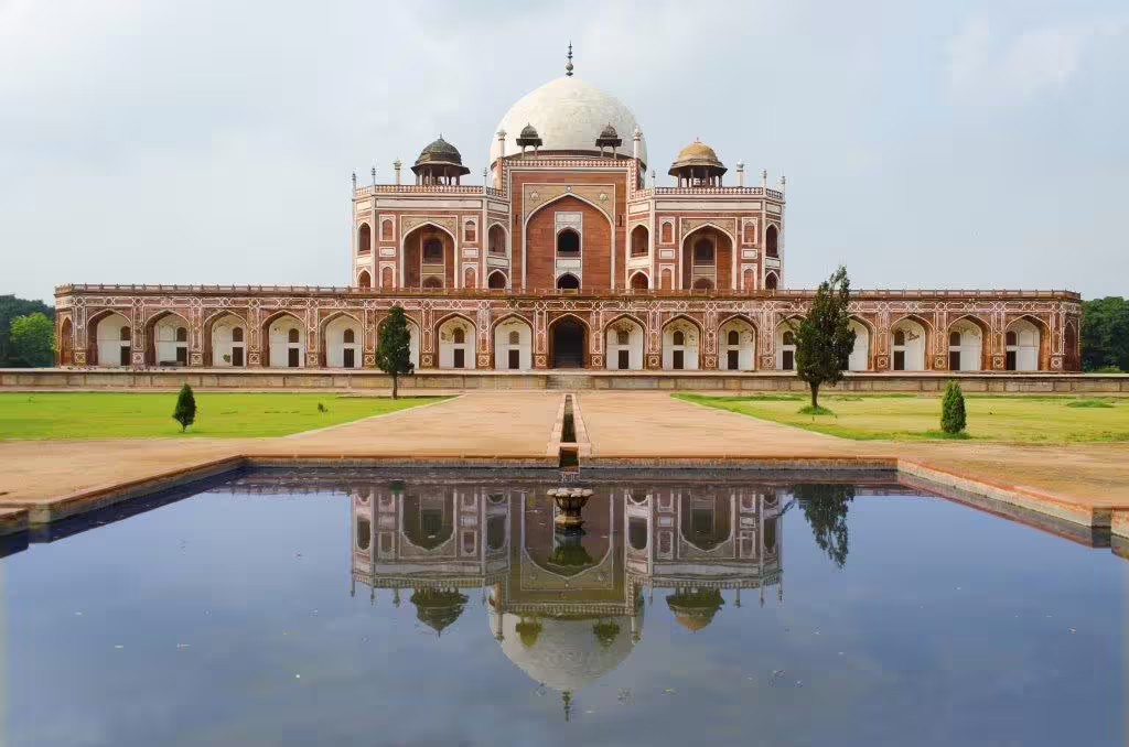 Humayun's Tomb in Delhi with its reflection in the water, a UNESCO World Heritage Site on the Golden Triangle tour.