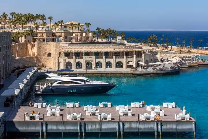 Red Sea marina in Hurghada with yacht and waterfront resort, easy transfer from Hurghada airport to hotels