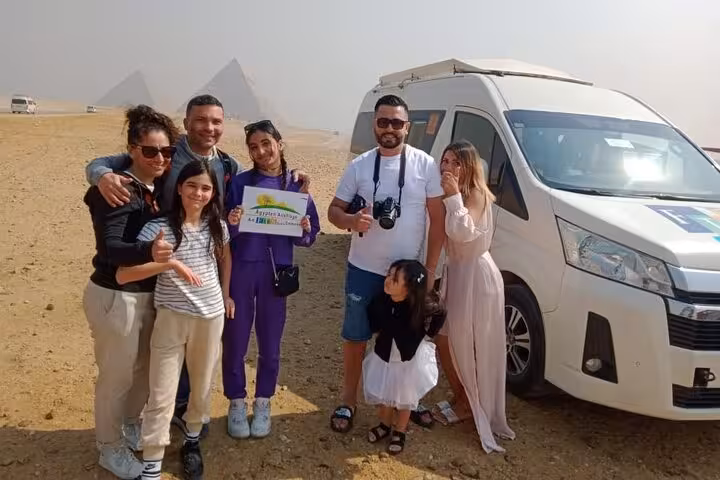 Group tour photo by minivan in Giza desert on Hurghada to Cairo pyramids excursion with Grand Museum stop
