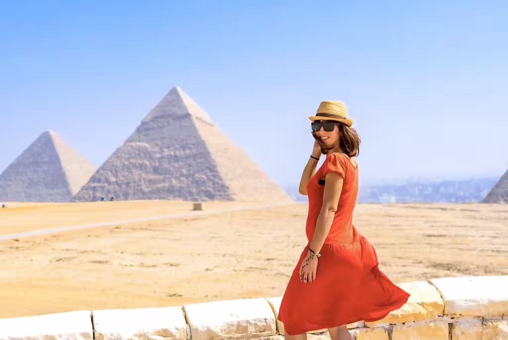 Traveler at Giza Pyramids in Cairo, photo stop on Hurghada day trip to Sphinx and Grand Egyptian Museum