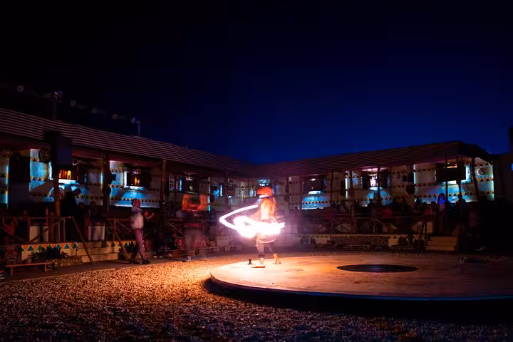 Fire show at Hurghada desert camp dinner, part of Super Quad and Spider car safari with evening entertainment