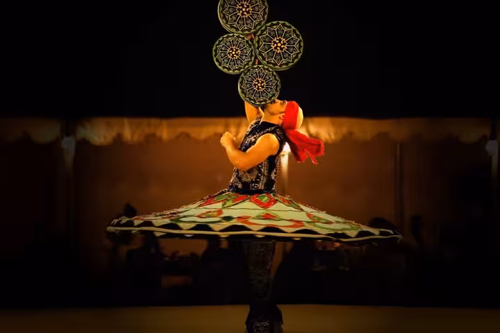 Tanoura dancer performing at Bedouin village evening show, part of Hurghada jeep super safari dinner tour