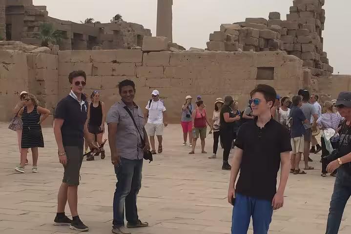 Tourists with local guide at Karnak Temple complex, Luxor on private Hurghada to Luxor day tour