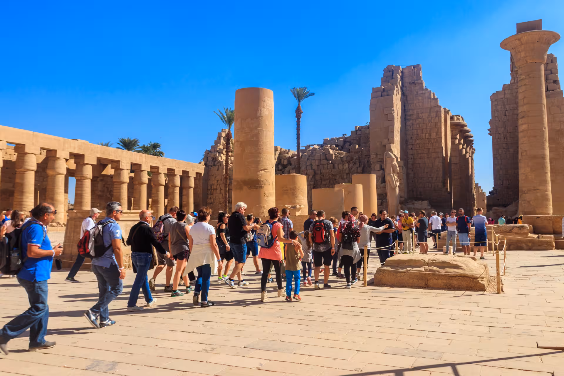 Tour group at Karnak Temple, Luxor on Hurghada excursion with guided sightseeing and Valley of the Kings visit