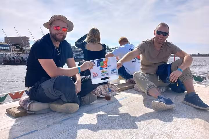 Tourists on a Nile boat in Luxor on Hurghada day trip to Valley of the Kings and Tutankhamun tomb
