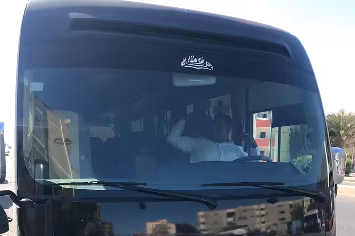 Air-conditioned minibus for Hurghada Airport to Marsa Alam transfer, ideal for families and small groups