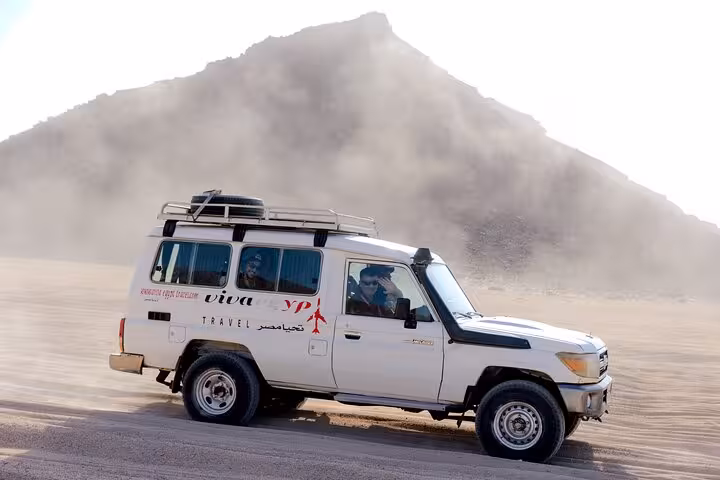 4x4 desert transfer in Hurghada for 3-hour quad bike safari and camel ride across sandy dunes