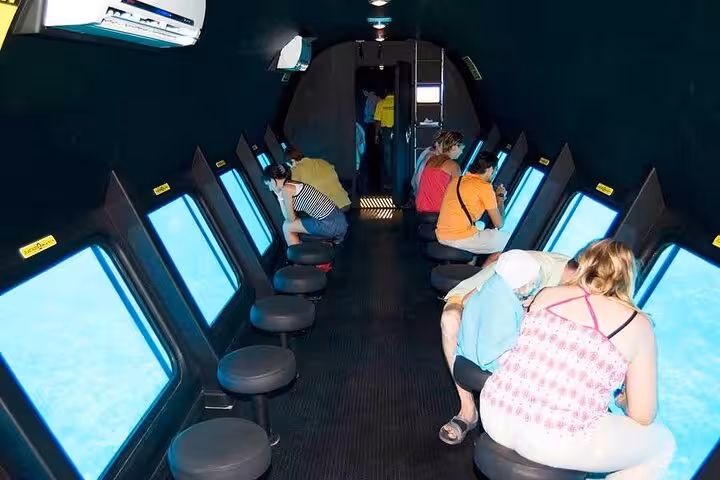 Inside Hurghada semi-submarine cabin with panoramic windows for Red Sea coral reef and fish viewing