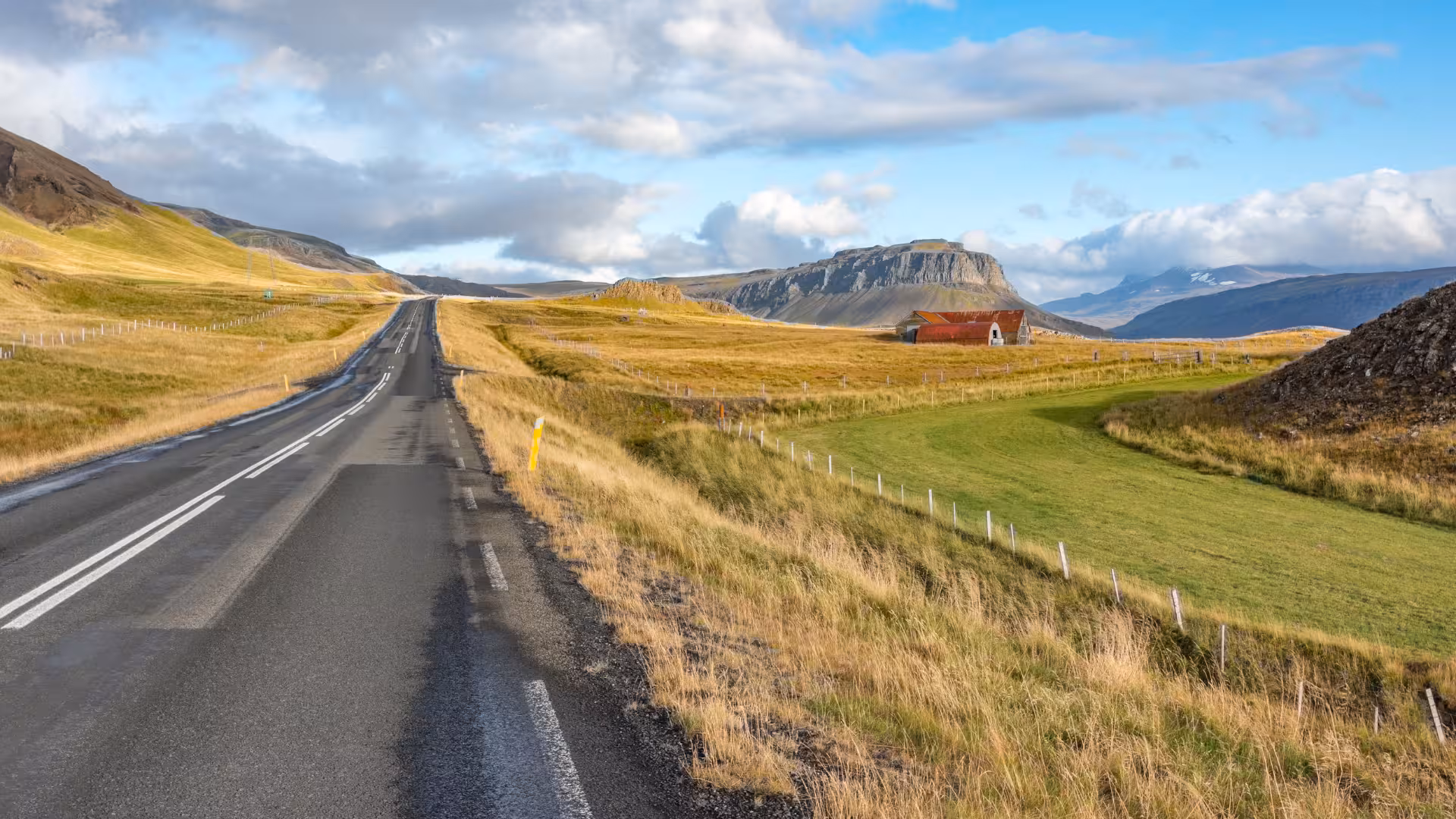 Road trip through Hvalfjörður valley, Iceland fjord blast tour route near Hvammsvík geothermal baths stop