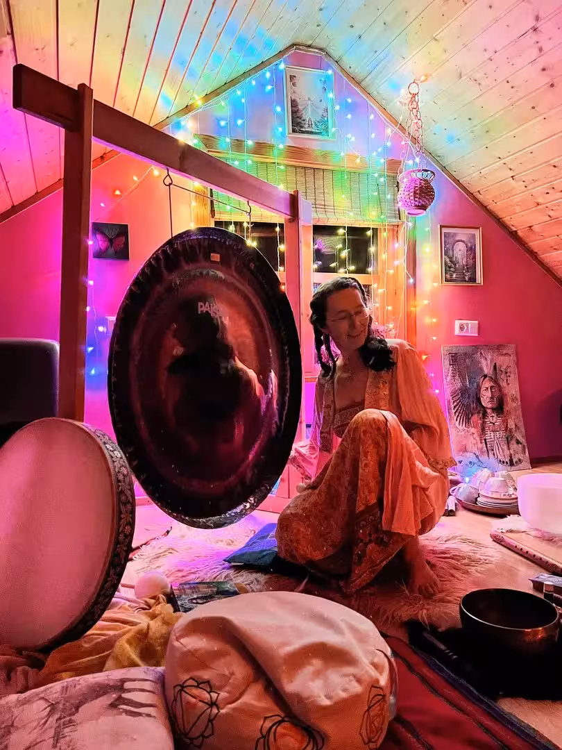Cozy cacao ceremony with gong sound bath in Iceland cabin, part of private Sacred Iceland Christmas tour
