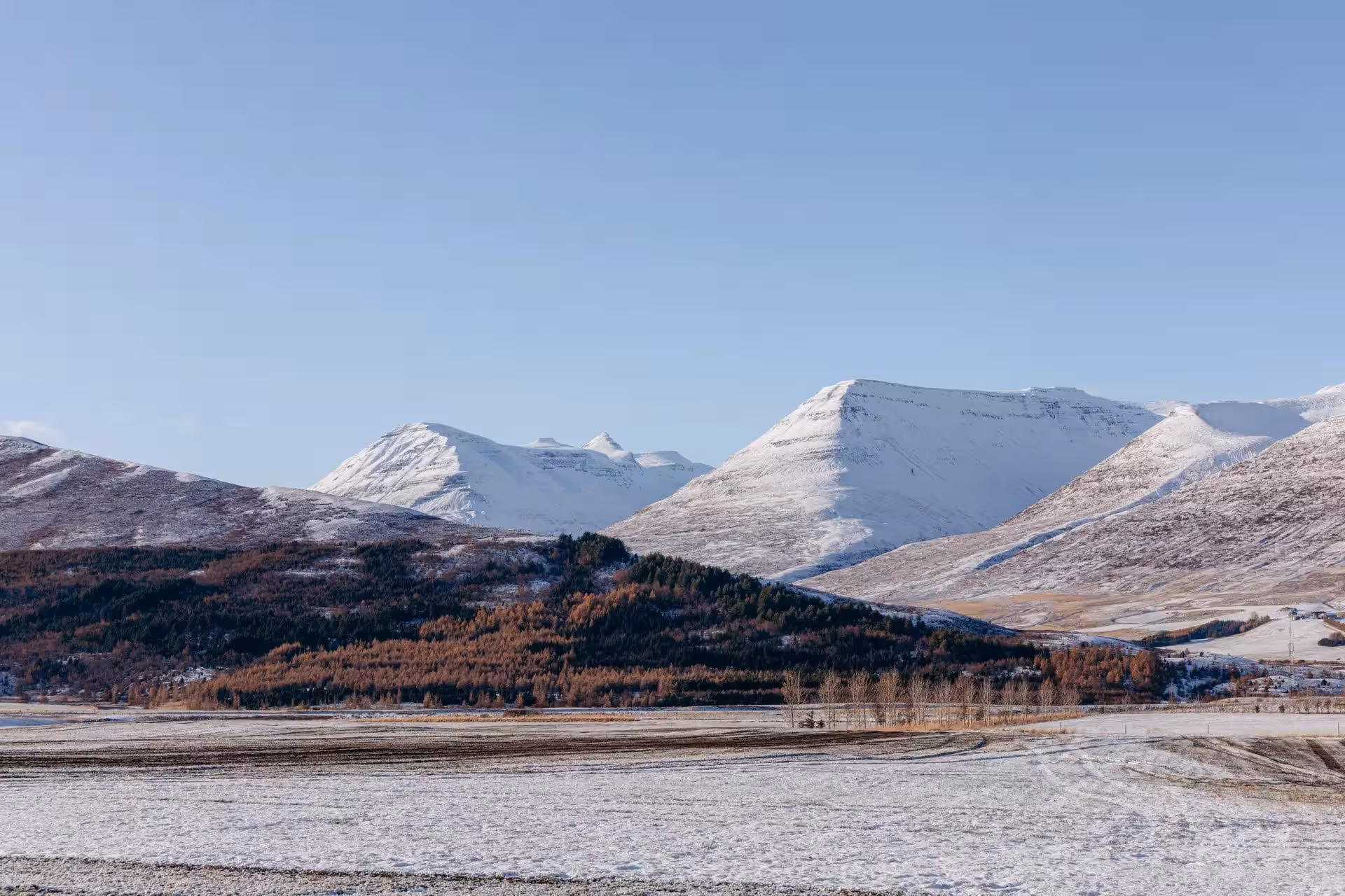 Snowy Iceland mountain panorama on a private winter tour near Goðafoss Waterfall, North Iceland scenery