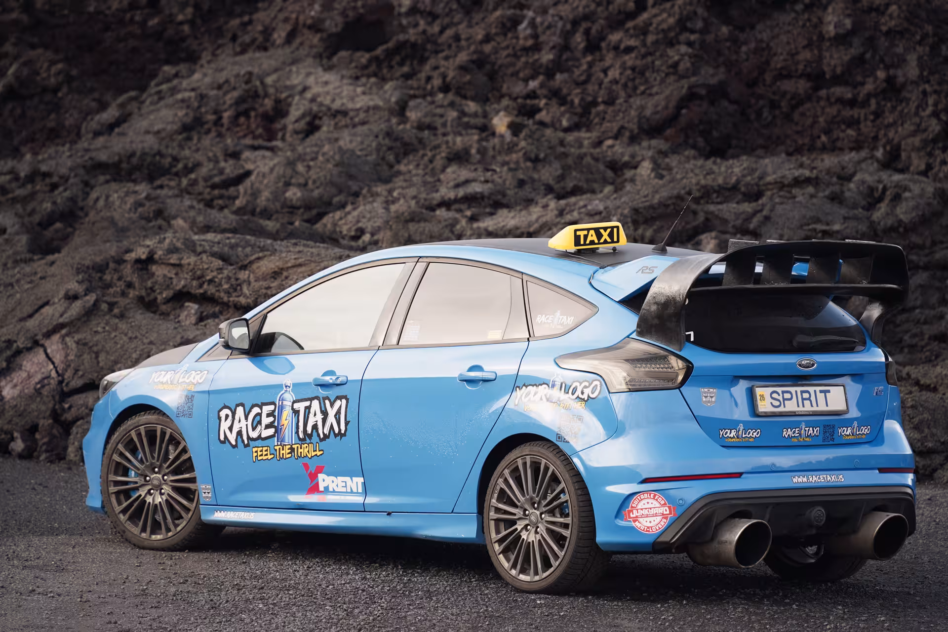 Blue Race Taxi rally car in Iceland lava fields, private Keflavik Airport transfer with thrill ride