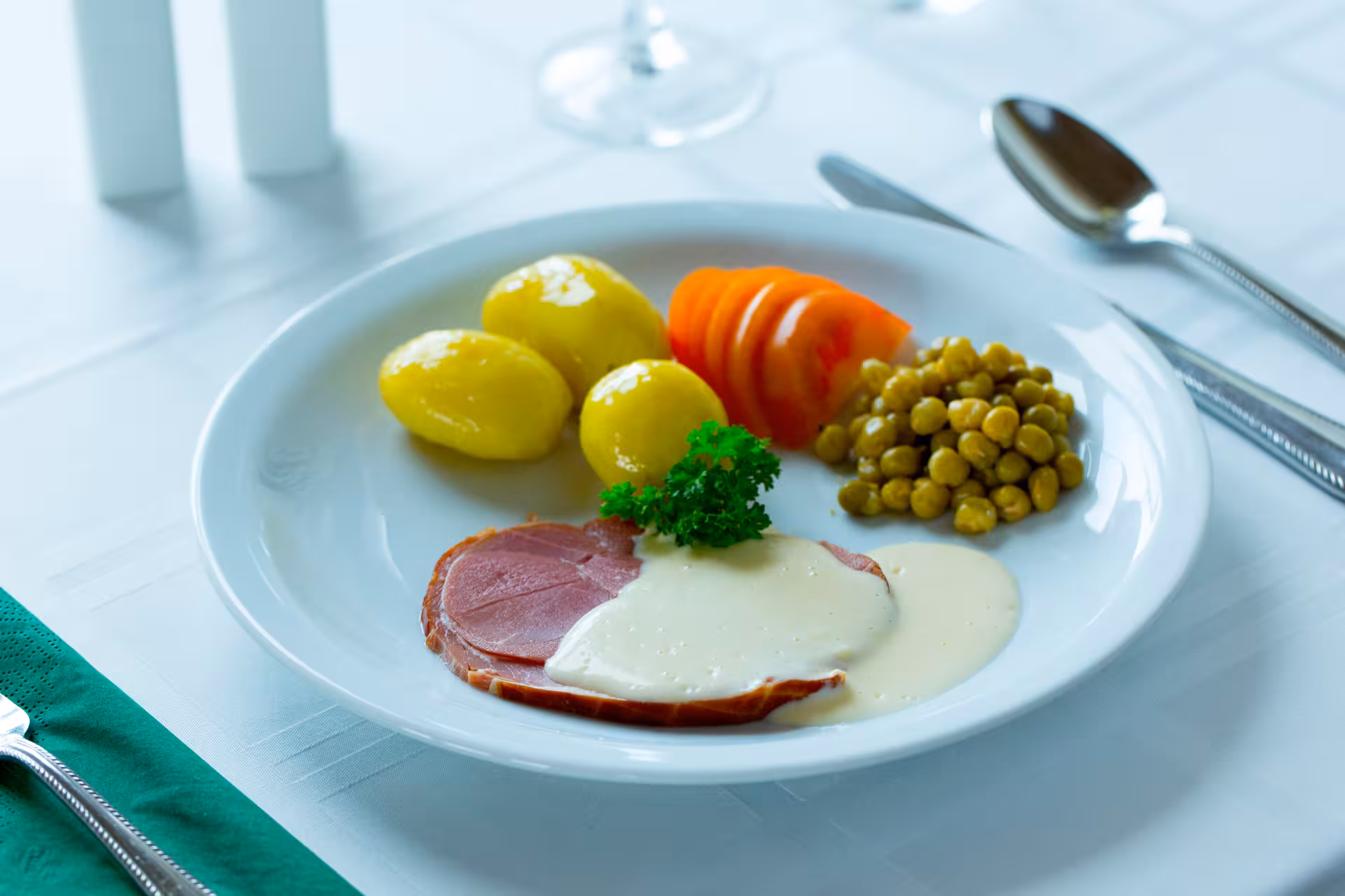 Traditional Icelandic meal with ham, potatoes, peas and creamy sauce, seasonal specialty tasting tour