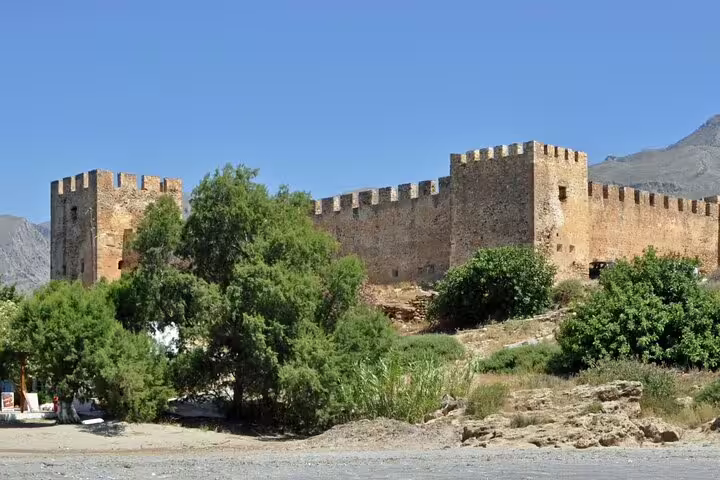 Discover the lush greenery surrounding the medieval fortress on the Imbros Gorge Adventure Hike, a must-see for nature lovers.