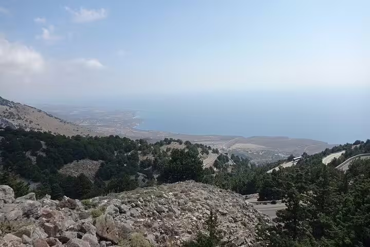 Scenic view from Imbros Gorge with lush forests and expansive sea, ideal for a private adventure hike in Crete.