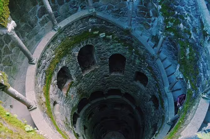 Descend into the mystical Initiation Well at Quinta da Regaleira in Sintra on a guided small group tour from Lisbon.