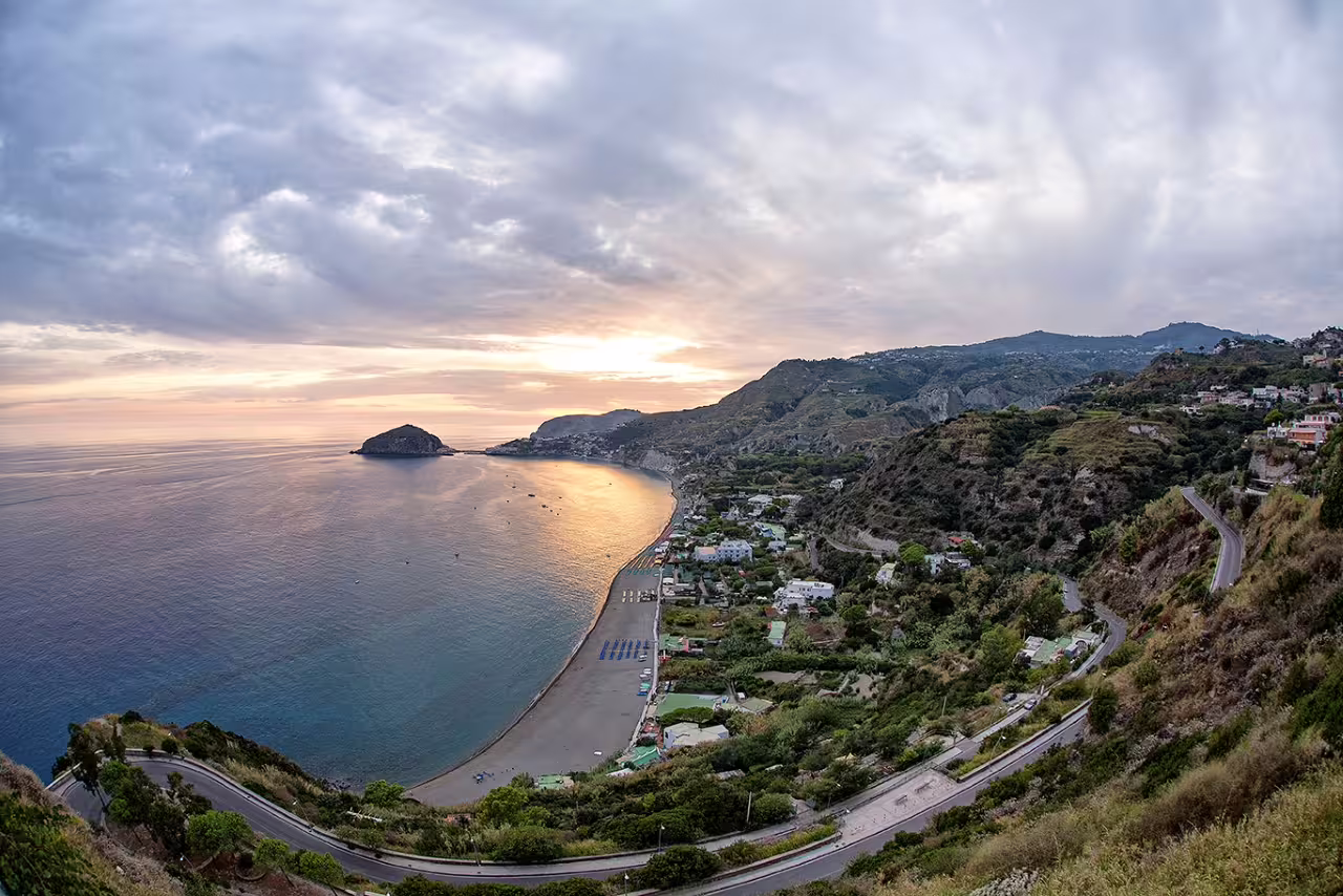 Panoramic sunset over Maronti Bay and Sant’Angelo, Ischia excursion with round-trip transfers from Naples