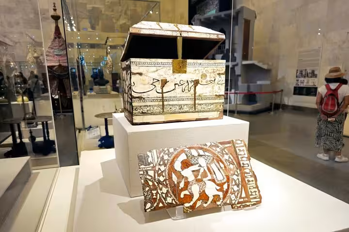 Islamic-era decorated chest and mosaic panel on display in Cairo, part of Old Cairo and Citadel tour