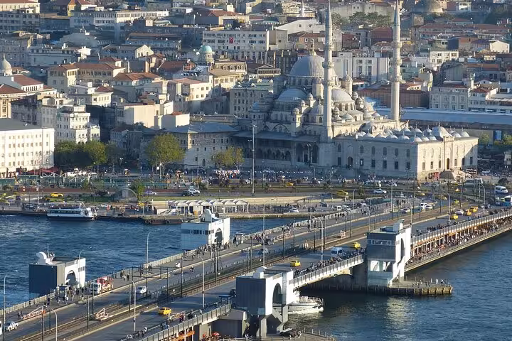Golden Horn and Galata Bridge with Yeni Mosque skyline seen from Istanbul Bosphorus sightseeing cruise