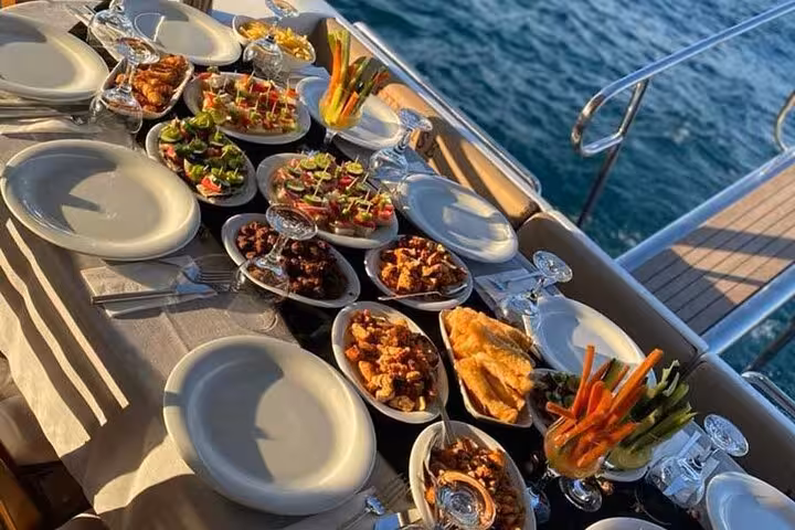 Turkish meze and snacks served on deck during a private Istanbul Bosphorus yacht cruise at sunset