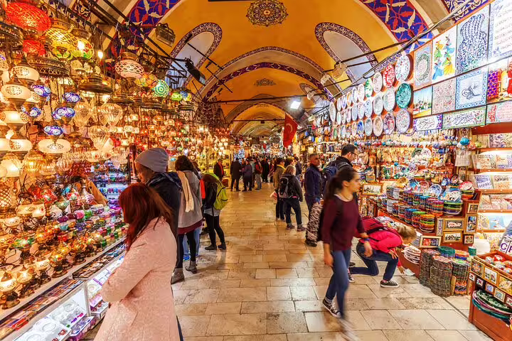 Discover vibrant colors and bustling aisles of the Grand Bazaar, a highlight of Istanbul's private tour from Galata Port.