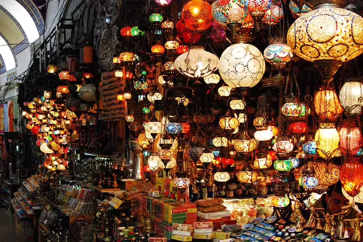 Vibrant Grand Bazaar with colorful lamps and goods on Istanbul private tour from Galataport.