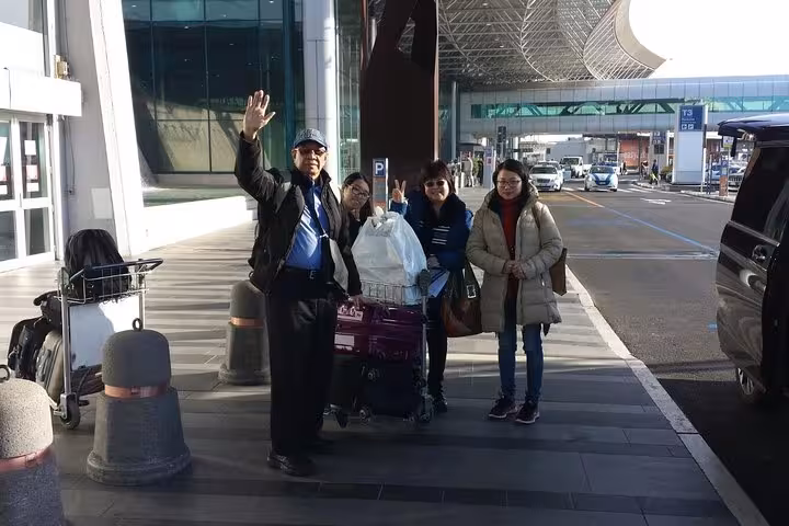 Travelers with luggage at Italy airport transfer, start of 10-day Rome Florence Pisa Milan Venice tour