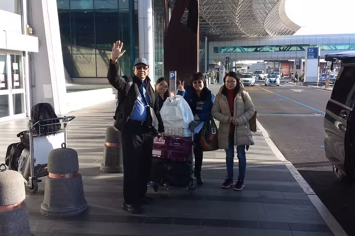 Private tour guests with luggage at airport pickup, start of 10-day Italy journey from Rome to Venice