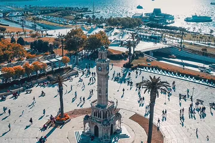 Aerial view of Izmir Clock Tower at Konak Square by the sea, featured on 4-day mini group tour to Ephesus and Pamukkale