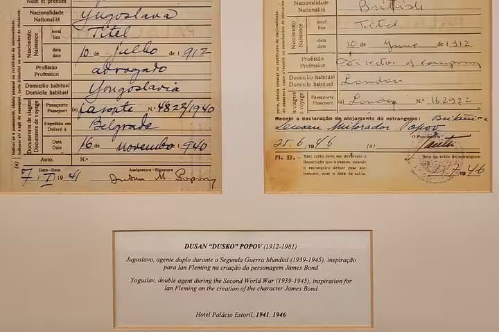 Historical documents at Hotel Palácio Estoril linked to WWII spy Duško Popov, a James Bond inspiration.