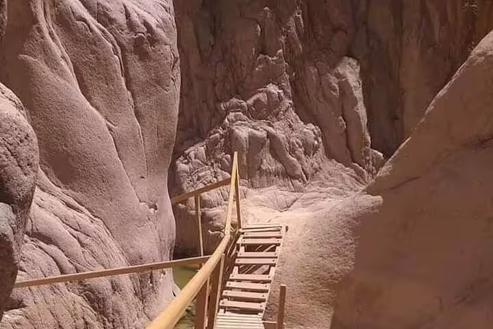 Wooden stairway through narrow Sinai canyon on private Jeep safari to Lost Lake and Dahab from Sharm El Sheikh