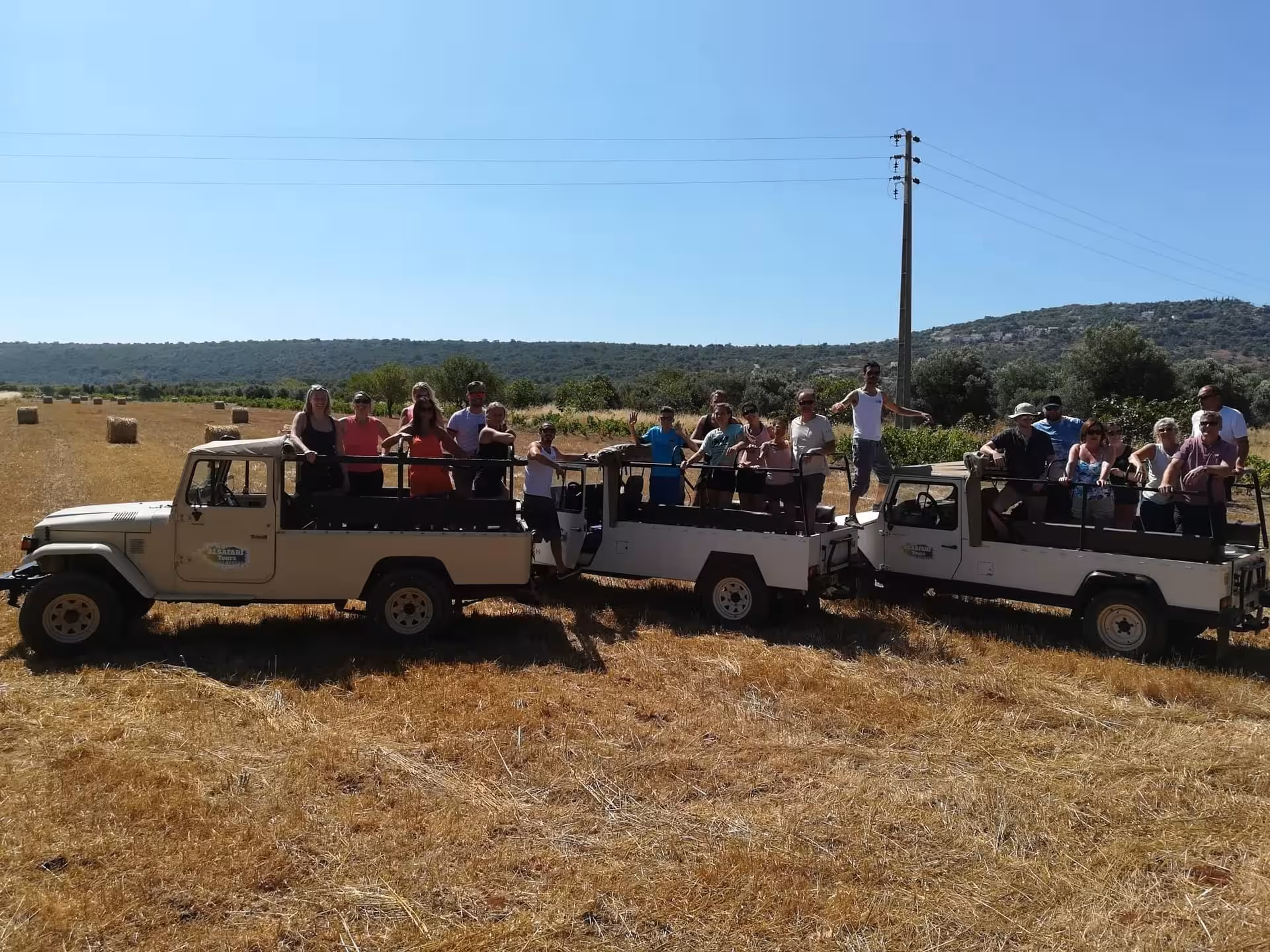 Group jeep safari through sunlit countryside before a sunset sparkling wine experience in the Turkish mountains