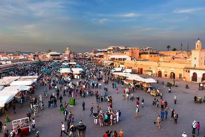 Jemaa el-Fnaa square Marrakech souk crowds, city highlight on Morocco 12 days 11 night desert tour from Agadir