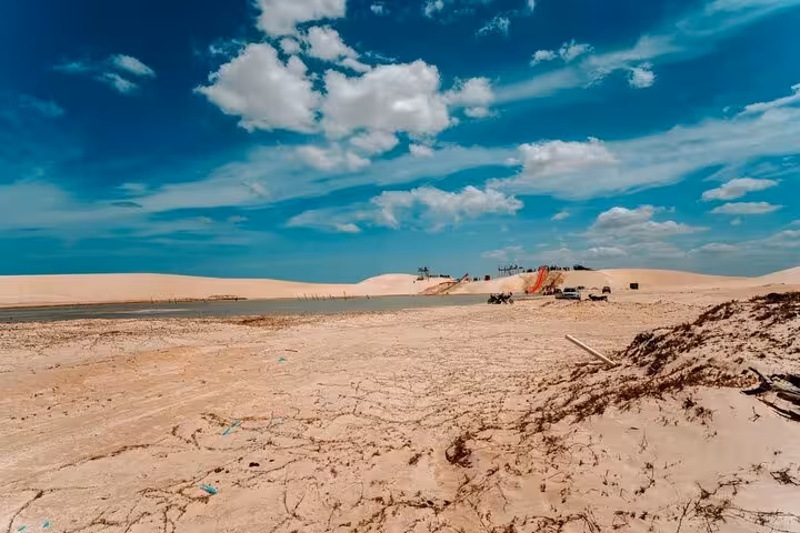 Wide dunes and lagoon landscape stop on the Jericoacoara West Coast tour, showcasing Ceará’s desert-like scenery