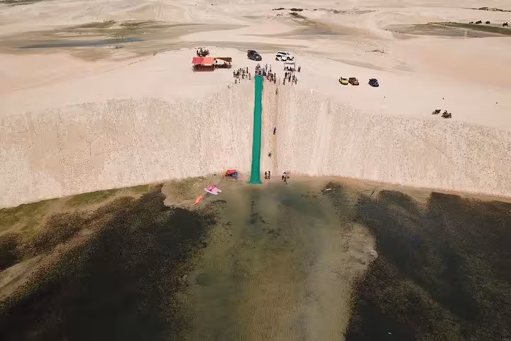 Aerial view of Lagoa do Paraíso dune slide and lagoon, a highlight of the Jericoacoara West Coast tour in Ceará