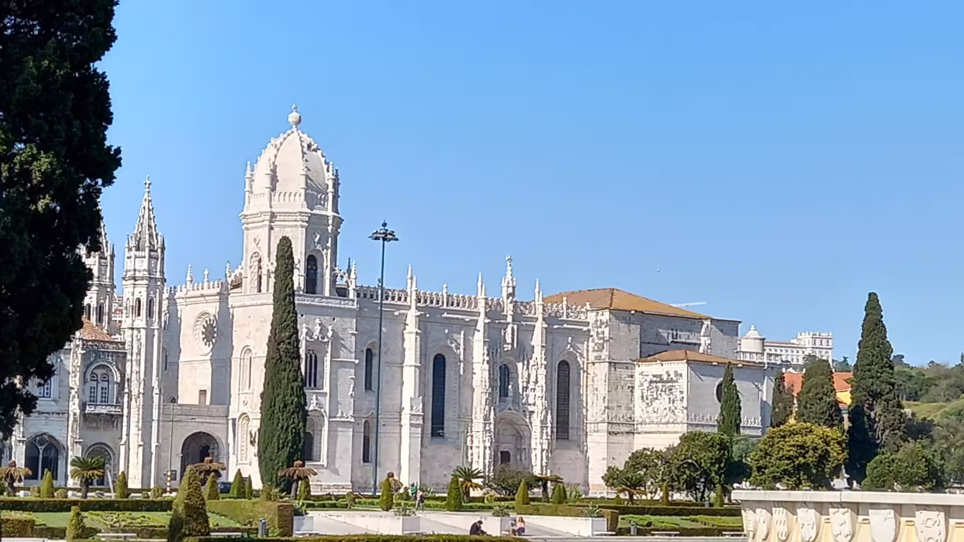 Majestic view of Jerónimos Monastery's ornate architecture in Lisbon, a key attraction on the Belem to Sintra tour.