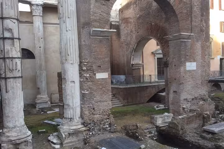 Ancient Roman ruins in the Jewish Ghetto highlighting historical architecture on a private walking tour in Rome.