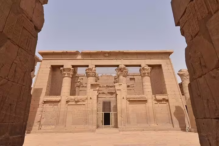 Wide view of Kalabsha Temple facade framed by ruins in Aswan, part of a Nubian Museum private guided tour