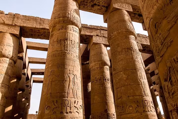Karnak Temple hypostyle hall columns with hieroglyphs on a private full-day Luxor sightseeing tour with lunch