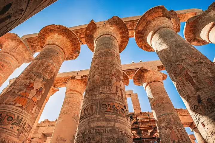 Painted columns at Karnak Temple Luxor, part of a private Cairo to Luxor day tour by plane