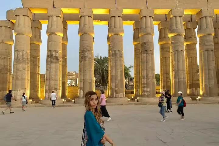 Karnak Temple illuminated columns in Luxor, highlight of East Bank Nile tour with guided sightseeing