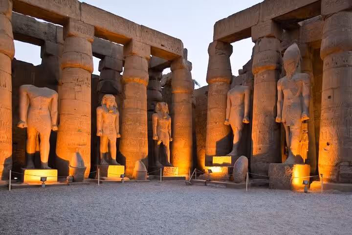 Karnak Temple statues and columns at sunset, private full-day Luxor sightseeing tour with lunch from Luxor