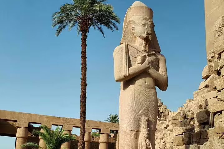 Ancient pharaoh statue at Karnak Temple, Luxor private tour from Cairo by air with expert Egyptologist