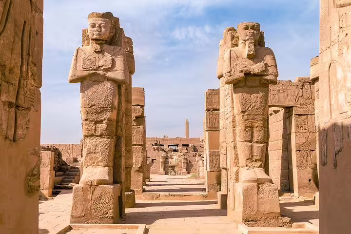 Karnak Temple avenue of ram-headed sphinx statues in Luxor on a private day tour from Cairo by plane