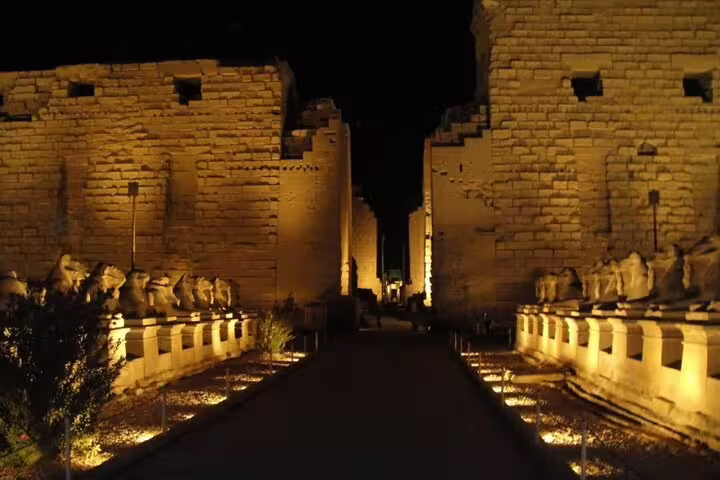Night view of Karnak Temple sphinx avenue lit for the Sound and Light Show day tour in Luxor, Egypt