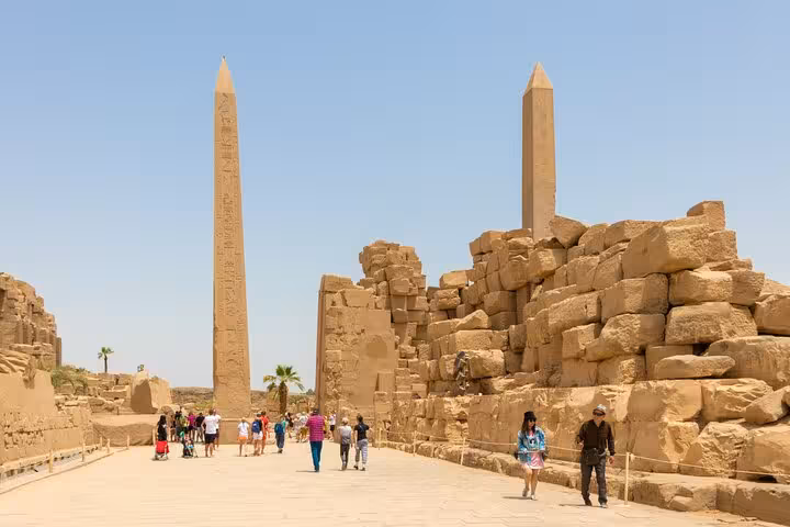 Avenue of Sphinxes and towering obelisks at Karnak Temple, Luxor East Bank stop on full-day tour